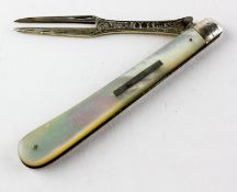 A late 19th century silver travelling fork, with mother of pearl handle,