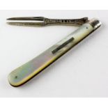 A late 19th century silver travelling fork, with mother of pearl handle,