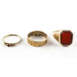 A collection of three rings to include: A 9ct gold agate signet ring (shank broken);