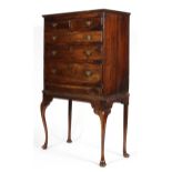 A reproduction George III style mahogany chest on stand,