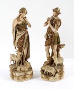 A pair of Royal Dux figures of a shepherd and companion, circa 1900, applied pink pad marks,