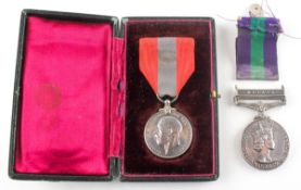 A George V Faithful Service medal, inscribed to Harry George White,