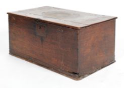 An oak trunk, probably 18th century, the hinged top revealing three partitions,