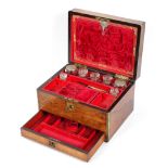 A Victorian rosewood and brass mounted vanity box, the hinged cover revealing a interior,