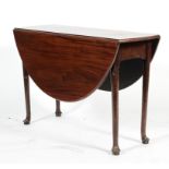 A Queen Anne style oval, mahogany gateleg dining table, on slender legs with raised pad feet,