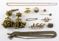A collection of miscellaneous costume jewellery to include brooches, chains,