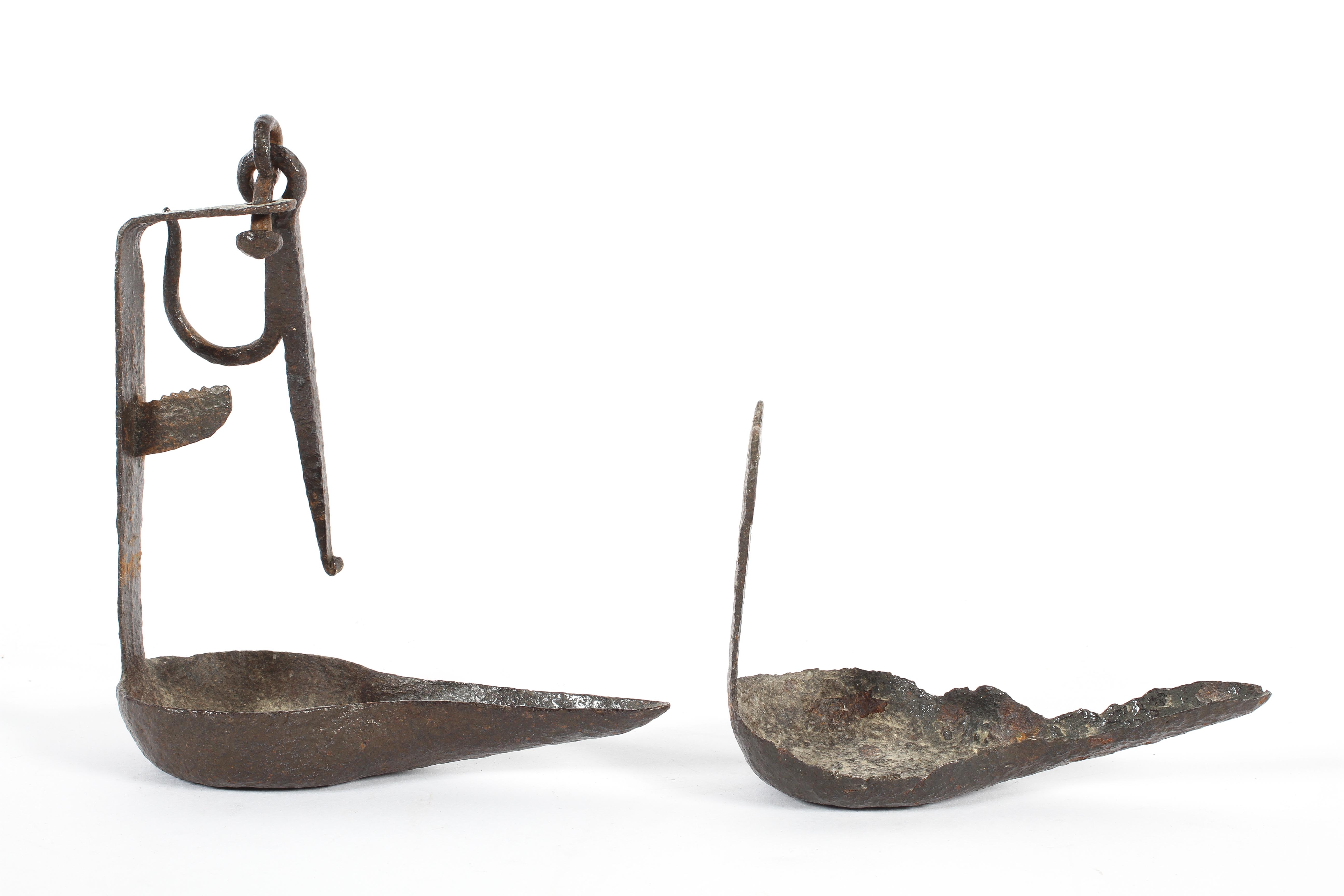 An antique wrought iron 'Whale' oil lamp,