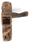 Tribal Art: A carved wooden figural plane, possibly Polynesian,