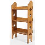 An Arts and Crafts Liberty style oak three tier small bookcase,