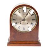 A Parsons Ltd (Bristol) bracket clock, with silvered dial and black Roman numerals,