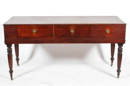A Victorian mahogany and line inlaid sideboard, with two drawers and a false drawer,