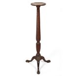 A George III style mahogany torchere stand, early 20th century,