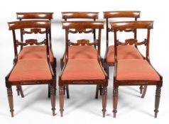 A set of six Victorian mahogany dining chairs,