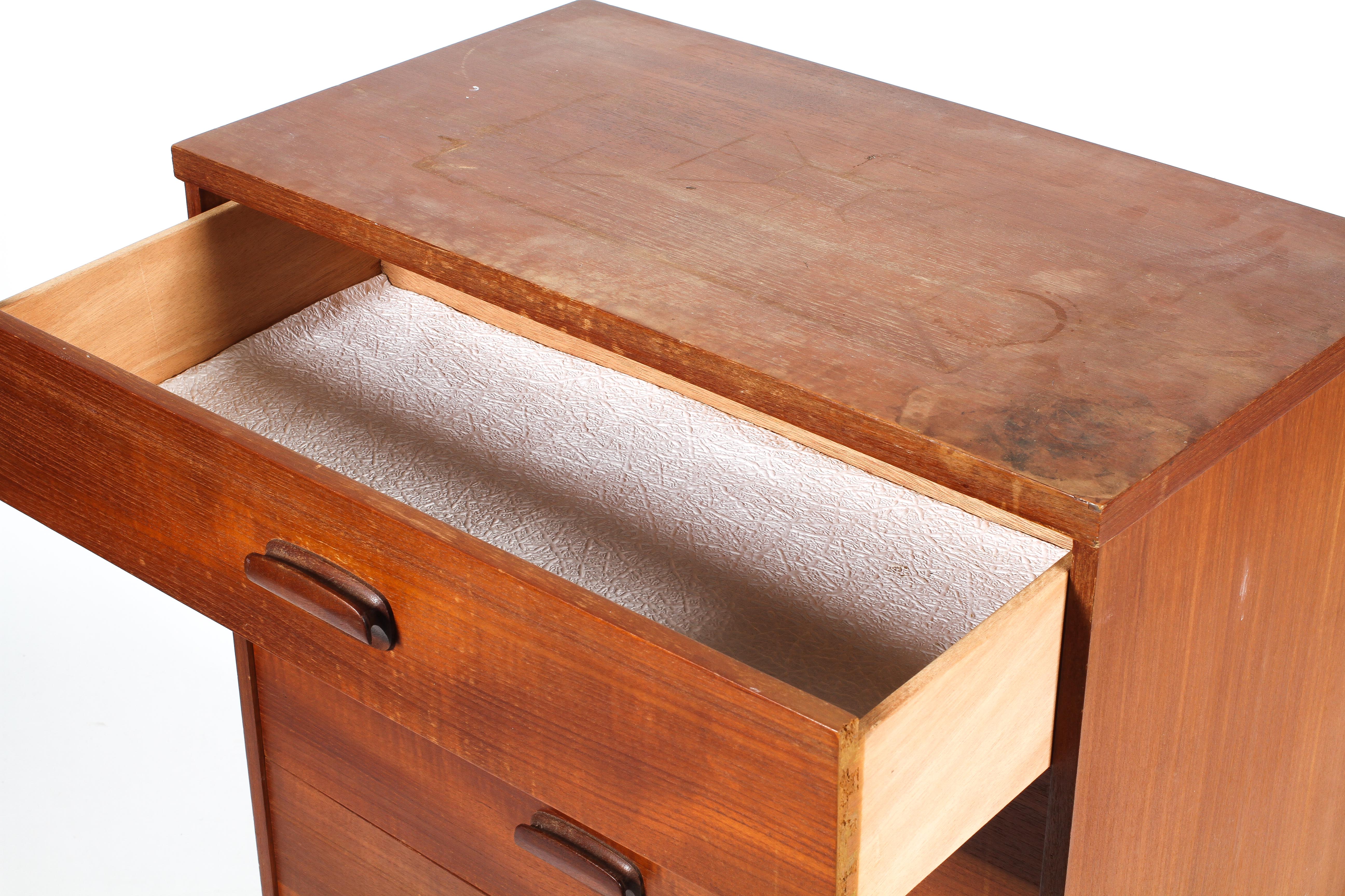 A mid-century teak chest of four drawers, on tapering legs, - Image 2 of 2