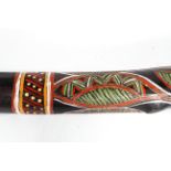 A hand painted didgeridoo,