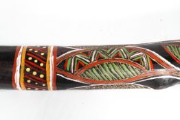 A hand painted didgeridoo,