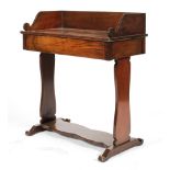 A 19th century mahogany desk/wash-stand, with galleried top above frieze drawer,