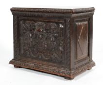 A small oak coffer or box, 17th century or later, with carved foliate rims,