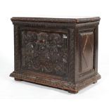 A small oak coffer or box, 17th century or later, with carved foliate rims,