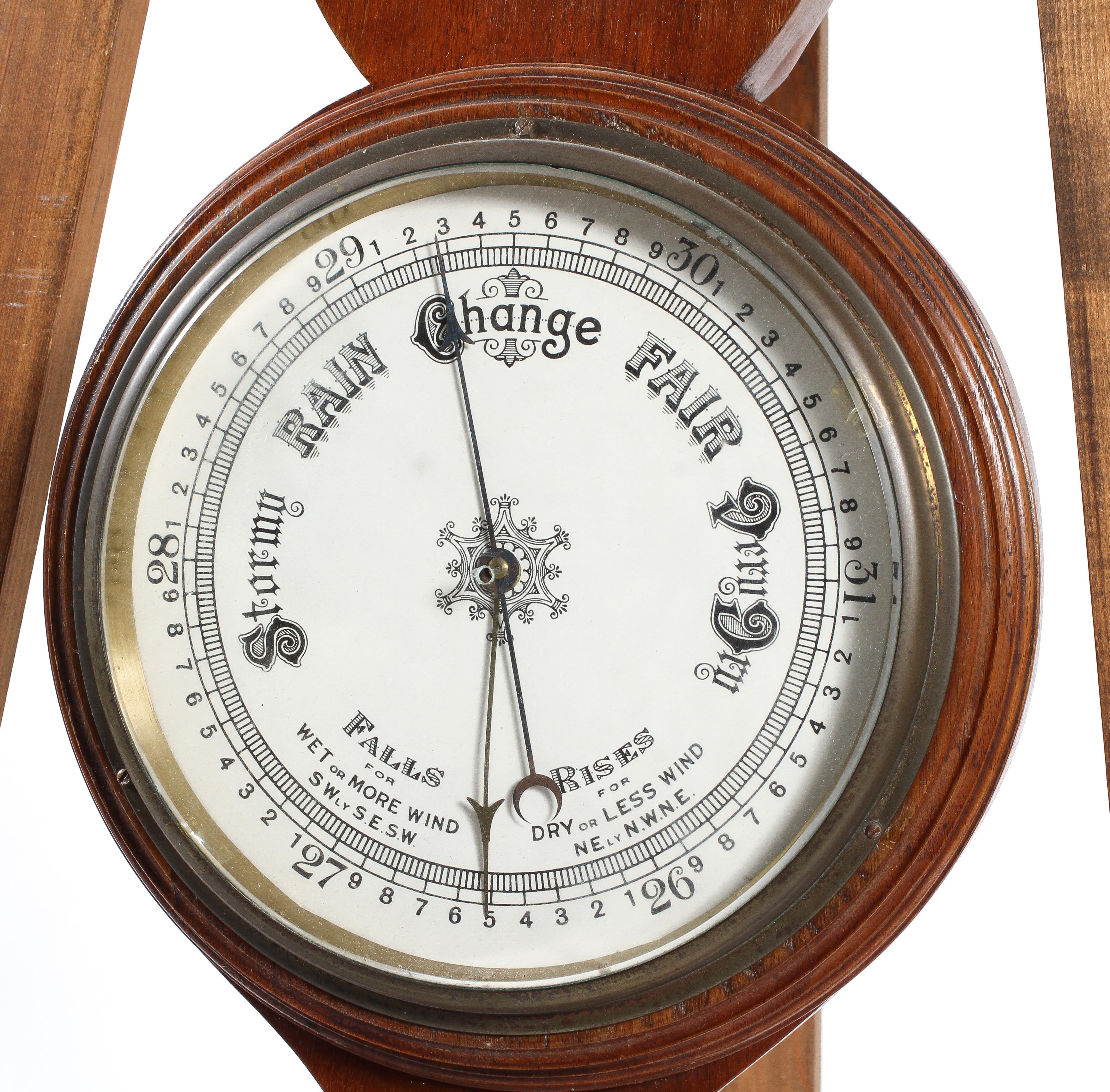 A mahogany wheel barometer with ivorine thermometer gauge and main dial, - Image 2 of 2