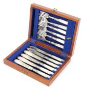A canteen of six silver-plated fish knives and forks with mother of pearl handles,