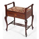 An Edwardian mahogany and inlaid piano stool,