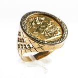 A yellow metal ring set with a full sovereign dated 1958. Hallmarked 9ct gold, London, 1970.