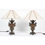 A pair of late 19th century spelter vases adapted as lamps,