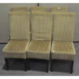 Six modern dining chairs, upholstered in gold fabric, with wooden legs,