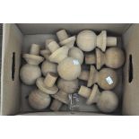 A box of pine finials,