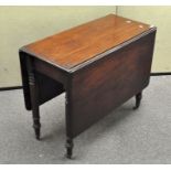 A Victorian mahogany drop leaf table,