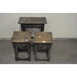 A group of three oak stools, including a late 18th/early 19th century example,