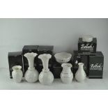 A collection of seven Belleek fine Parian china vases and dishes, all in original boxes,