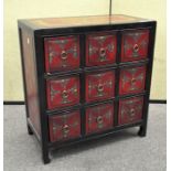 A Contemporary Asian collector's cabinet, comprising nine drawers,