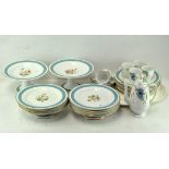 A six piece tea service with floral decoration,