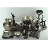 An assortment of silver plated wares, to include an ornate six slice silver toast rack,