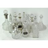 A selection of glass decanters, including a ships decanter,