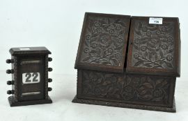 A carved walnut stationery box,