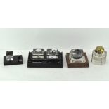 A Velos double inkwell on black ceramic base,