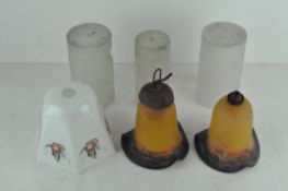 A group of six glass light shades,