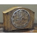 A Continental burr walnut veneered mantel clock, the dial with Arabic numerals denoting hours,