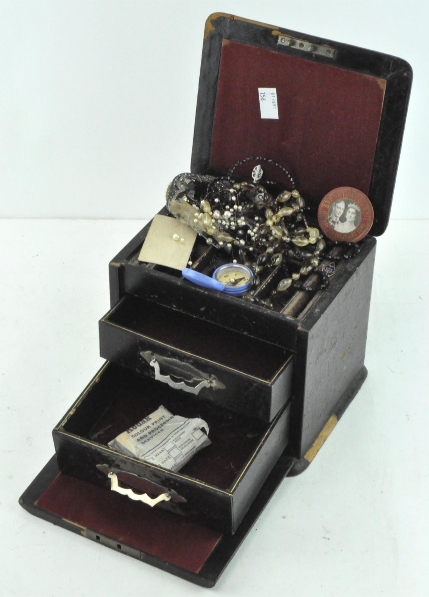 A leather cased jewellery box, containing a selection of necklaces,