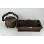 A wooden cutlery tray and an Eastern wooden food pot and cover,