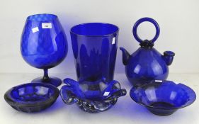 A collection of "Bristol" blue glassware, including dishes,