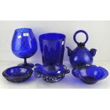 A collection of "Bristol" blue glassware, including dishes,