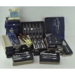 A collection of mostly stainless steel flatware, including numerous boxed Viners Love Story pieces,