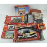 A selection of model railway scenery, including pieces by Tri-ang Hornby,