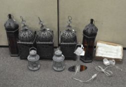 A selection of 19th & 20th century hanging lanterns, all with pierced metal frames and glass panels,