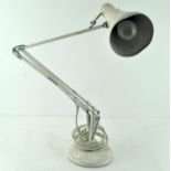 An anglepoise lamp by Herbert Terry, painted cream,