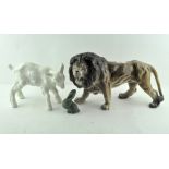 A group of three ceramic animals, to include a Melba ware lion,